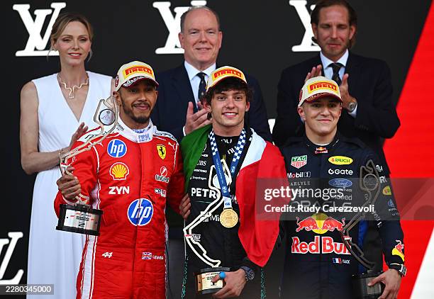 Race winner Andrea Kimi Antonelli of Italy and Mercedes AMG Petronas F1 Team Second placed Lewis Hamilton of Great Britain and Scuderia Ferrari and...