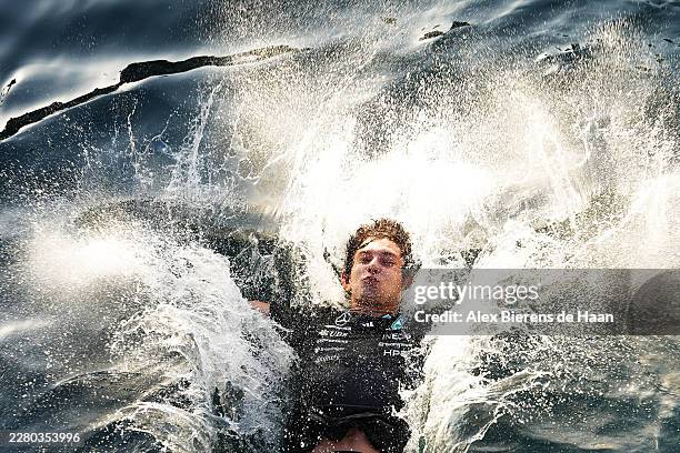 Race winner Andrea Kimi Antonelli of Italy and Mercedes AMG Petronas F1 Team celebrates in the sea during the F1 Grand Prix of Monaco at Circuit de...