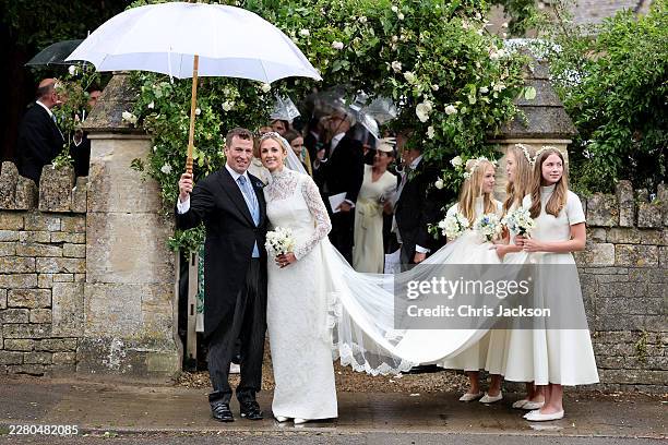 Peter Phillips and Harriet Sperling depart from their Royal wedding at All Saints' Church on June 06, 2026 in Kemble, England. Peter Phillips, the...