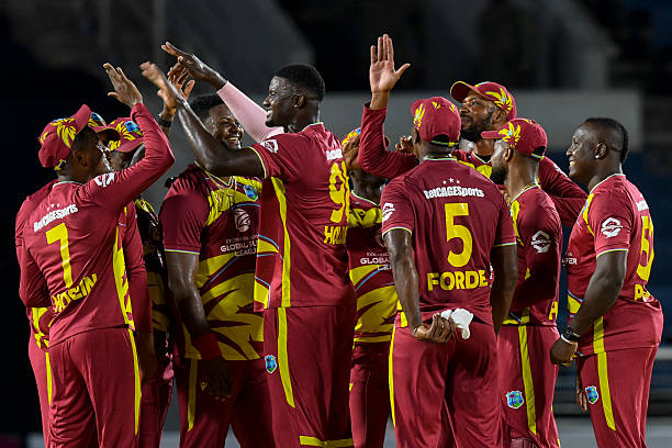 Jason Holder of West Indies celebrates the dismissal of unseen Lasith Croospulle of Sri Lanka during the first Twenty20 international cricket match...