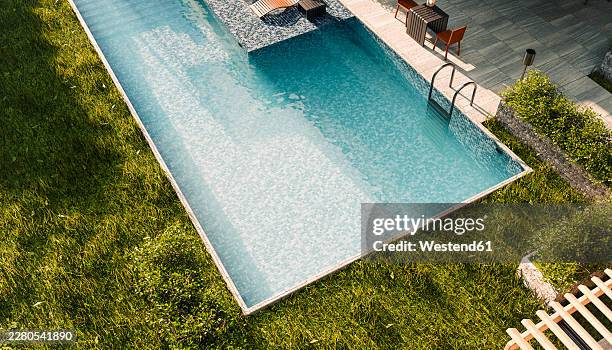 modern swimming pool in backyard of house on a sunny day - private property stock illustrations
