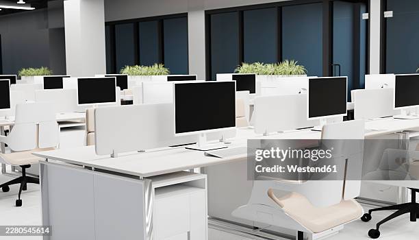 modern open office with computer workstations and indoor plants - open plan office stock illustrations