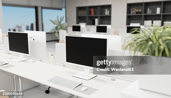 Modern minimalistic office interior with computer workstations and open workspace Modern minimalistic office interior with computer workstations and open workspace
