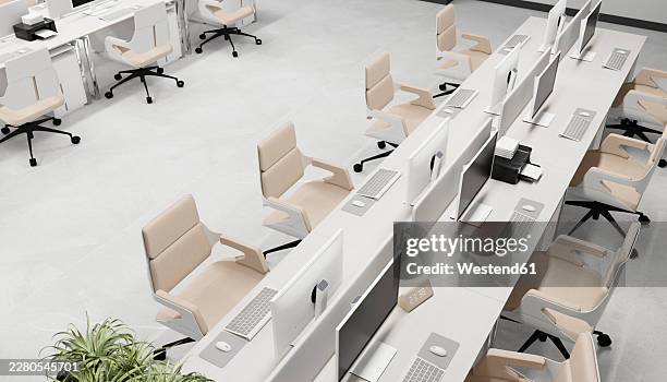 modern open office with computer workstations and indoor plant - clean desk stock illustrations