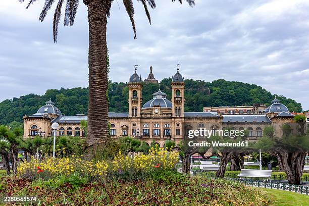 san sebastian city hall with beautiful park garden in spain - san sebastian spain stock pictures, royalty-free photos & images