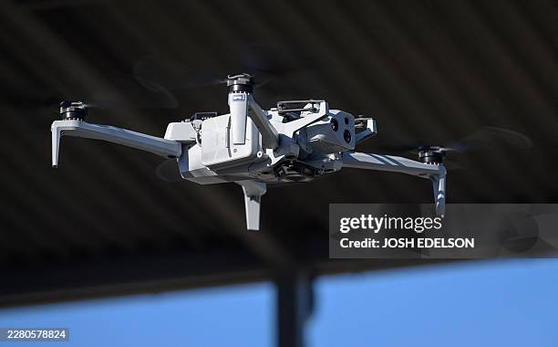 Skydio CEO Adam Bry demonstrates the Skydio X10 drone to US Trade Representative Jamieson Greer as Greer tours the SkyDio drone manufacturing...