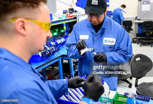 Skydio employees work on drone production as US Trade Representative Jamieson Greer tours the SkyDio Drone manufacturing facility in Hayward,...