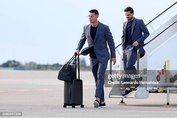 Cristiano Ronaldo and Bernardo Silva of Portugal arrive at Palm Beach International Airport ahead of the FIFA World Cup 2026 on June 12, 2026 in West...