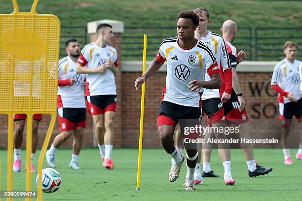Assan Quedraogo of Team Germany plays the ball during a Team Germany training session at W. Dennie Spry Soccer Stadium on June 08, 2026 in...