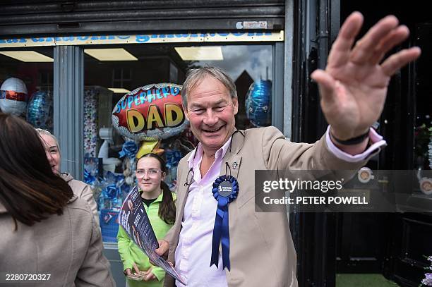 Restore Britain leader Rupert Lowe meets with locals as he campaigns for his party's candidate ahead of the Makerfield by-election on June 18, west...