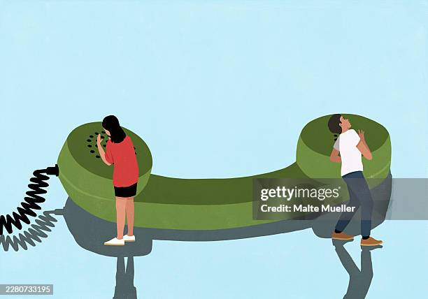 man and woman at opposite ends of large green telephone receiver against blue background - husband stock illustrations