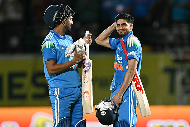 India's captain Shubman Gill and his teammate KL Rahul celebrate their team's win in the first one-day international cricket match against...
