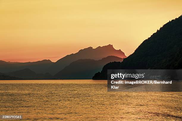 sunset at lake lucerne in switzerland - lake lucerne stock pictures, royalty-free photos & images