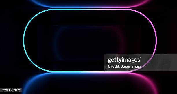 neon glowing frame against dark background with reflection - gebouwonderdeel stockfoto's en -beelden