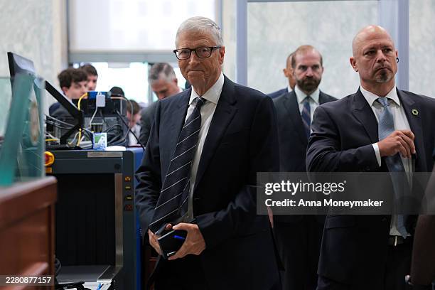 Microsoft Co-Founder Bill Gates walks through security as he arrives to testify at a closed-door interview with the House Oversight Committee on...