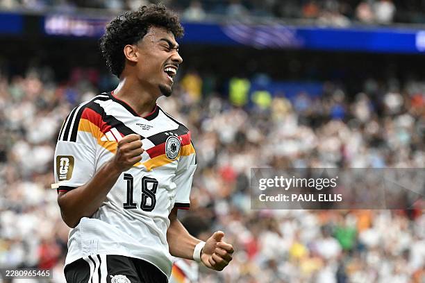 Germany's defender Nathaniel Brown celebrates after scoring a goal during the 2026 World Cup Group E football match between Germany and Curacao at...
