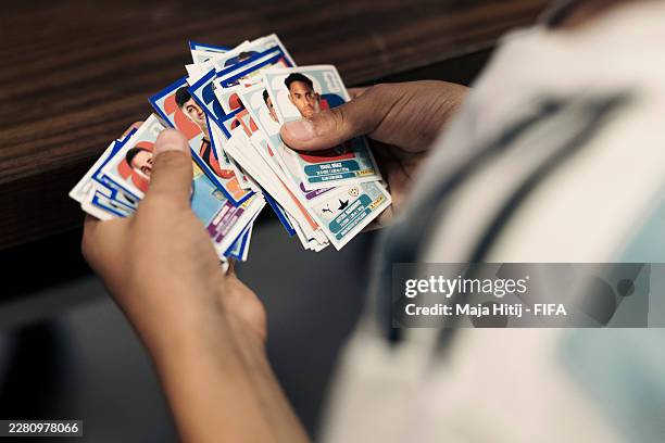 Fans exchange their spare World Cup Panini stickers on a train station on June 10, 2026 in Toronto, Canada.
