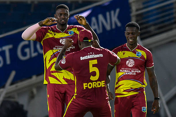 Jason Holder and Shamar Joseph of West Indies celebrate the dismissal of Dasun Shanaka of Sri Lanka during the third Twenty20 international cricket...