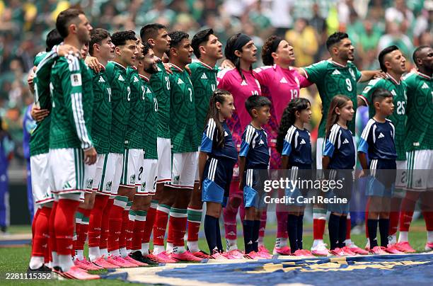 Players of Mexico stand and sing the national anthem during the FIFA World Cup 2026 Group A match between Mexico and South Africa at Mexico City...