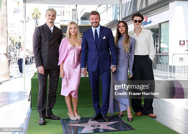 Romeo Beckham, Harper Beckham, David Beckham, Victoria Beckham and Cruz Beckham attend David Beckham's Hollywood Walk of Fame Star Ceremony on June...
