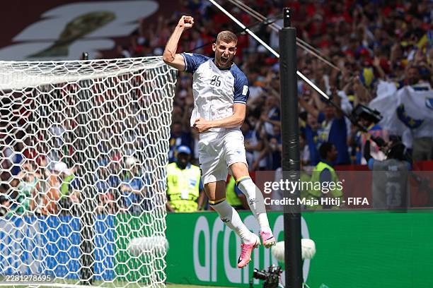 Jovo Lukic of Bosnia and Herzegovina celebrates scoring his team's first goal during the FIFA World Cup 2026 Group B match between Canada and Bosnia...