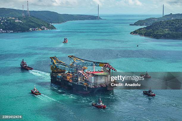 An aerial view of the 'Saipem 7000' the world's third-largest semi-submersible crane vessel used in natural gas pipeline construction, as it transits...