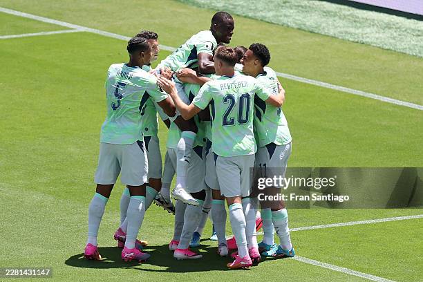 Breel Embolo of Switzerland celebrates with teammates after scoring a penalty for the team's first goal during the FIFA World Cup 2026 Group B match...