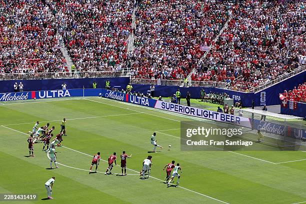 Breel Embolo of Switzerland scores a penalty for his team's first goal during the FIFA World Cup 2026 Group B match between Qatar and Switzerland at...