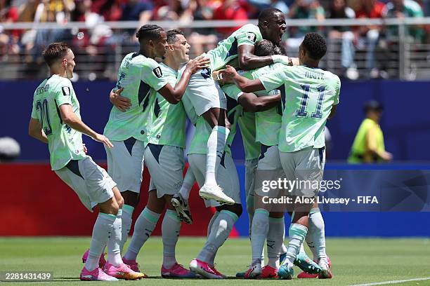 Breel Embolo of Switzerland celebrates with teammates after scoring a penalty for the team's first goal during the FIFA World Cup 2026 Group B match...