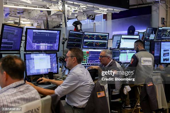 Traders On The Floor Of The New York Stock Exchange As Fed Chair Warsh Holds New Conference Traders On The Floor Of The New York Stock Exchange As Fed Chair Warsh Holds New Conference