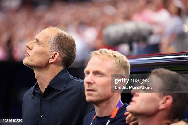 Thomas Tuchel Manager / Head Coach of England and assistant Anthony Barry during the National anthem during the FIFA World Cup 2026 Group L match...