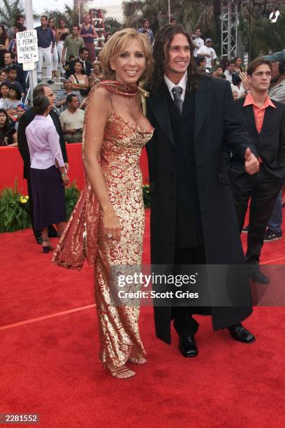 Laura Bozzo arrives with a guest at the Billboard Latin Music Awards at the Jackie Gleason Theater in Miami, Florida. 4/26/01 Photo by Scott...