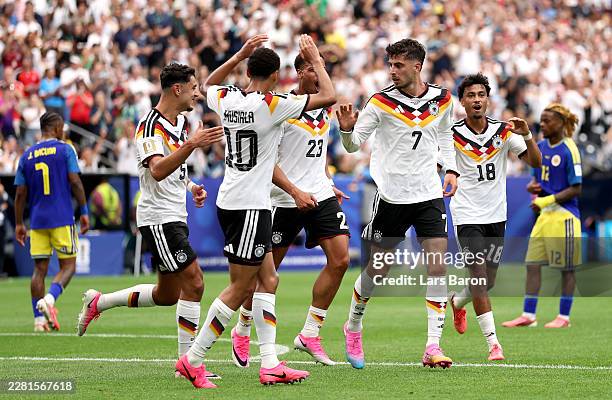 Kai Havertz of Germany celebrates with teammates after scoring the team's third goal during the FIFA World Cup 2026 Group E match between Germany and...