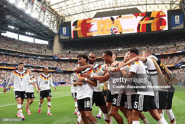 Nathaniel Brown of Germany celebrates with teammates after scoring the team's fifth goal during the FIFA World Cup 2026 Group E match between Germany...