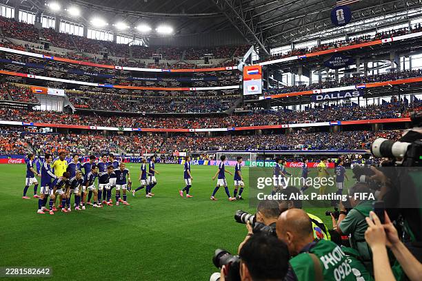 Japan players pose for a team photograph before the FIFA World Cup 2026 Group F match between Netherlands and Japan at Dallas Stadium on June 14,...