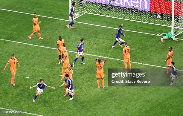 Koki Ogawa of Japan celebrates assisting on his team's second goal by Daichi Kamada during the FIFA World Cup 2026 Group F match between Netherlands...