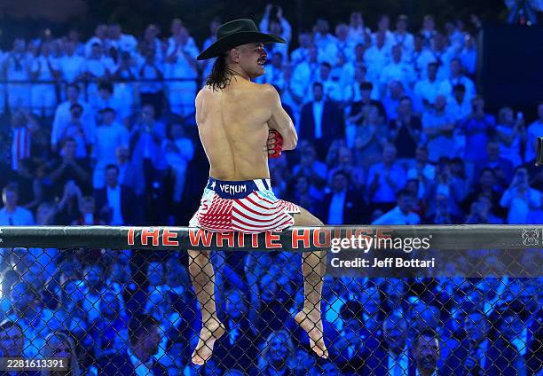 Diego Lopes of Brazil reacts to his win over Steve Garcia in a middleweight fight during the UFC Freedom 250 event on the South Lawn at the White...