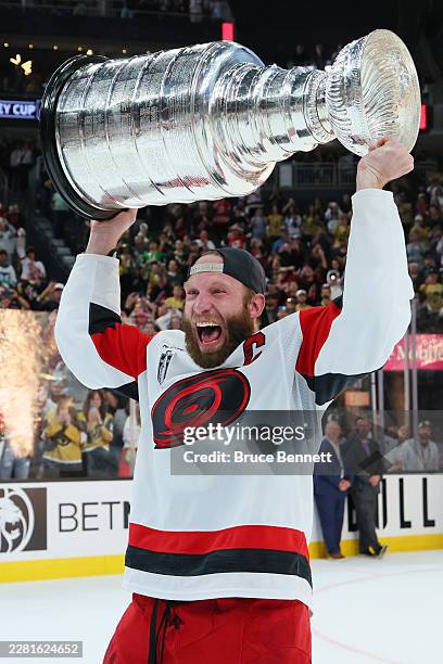 Jordan Staal of the Carolina Hurricanes celebrates while holding the Stanley Cup after Game Six of the 2026 Stanley Cup Final against the Vegas...