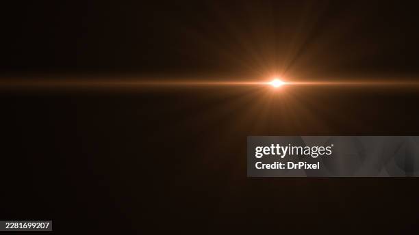 warm golden lens flare light background - light effect stock pictures, royalty-free photos & images