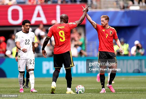 Romelu Lukaku of Belgium celebrates with Kevin De Bruyne after forcing an own goal by Mohamed Hany of Egypt during the FIFA World Cup 2026 Group G...