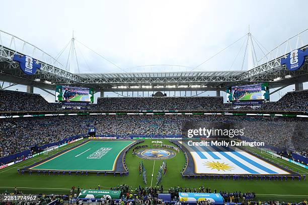 Players and match official line up before the FIFA World Cup 2026 Group H match between Saudi Arabia and Uruguay at Miami Stadium on June 15, 2026 in...