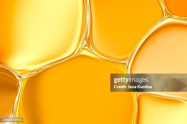 abstract metallic golden yellow liquid bubbles background for skincare serum, biotechnology and microscopic biology. futuristic cells, molecules and cosmetic texture symbolizing hydration, anti aging, scientific research and luxury beauty care concepts. - facial oil stock pictures, royalty-free photos & images