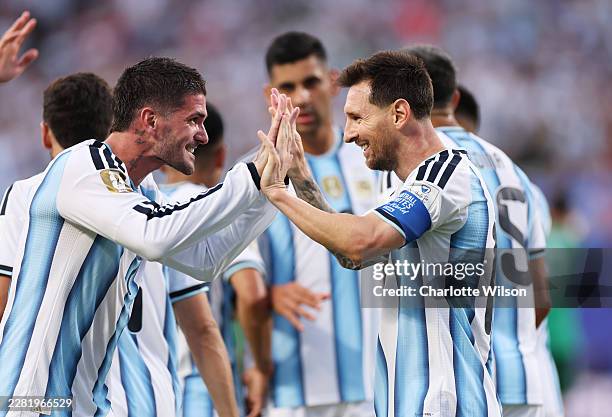 Lionel Messi of Argentina celebrates with teammate Rodrigo De Paul after scoring his team's first goal during the FIFA World Cup 2026 Group J match...