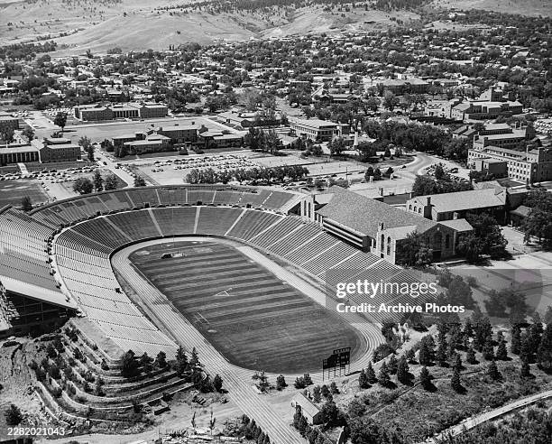High-angle view of Folsom Field on the University of Colorado campus in Boulder, Boulder County, Colorado, circa 1955. The stadium had undergone a...
