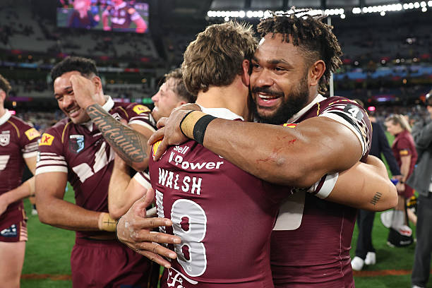 Hamiso Tabuai-Fidow and Reece Walsh of the Maroons celebrate victory following game two of the Men's State of Origin series between New South Wales...