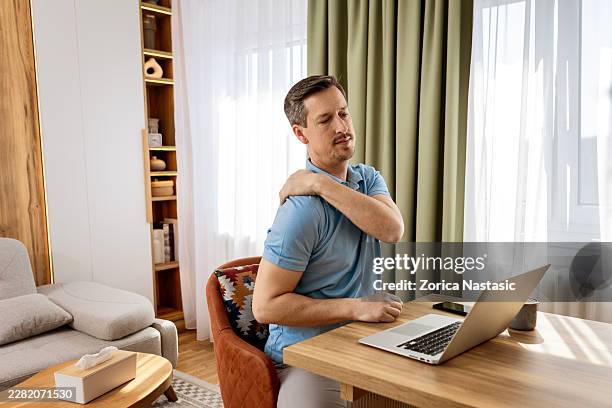 office ergonomics problem causing pain during remote work - bad posture desk stock pictures, royalty-free photos & images