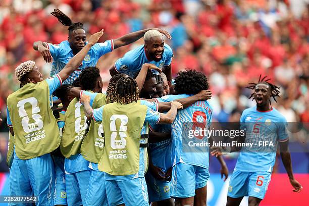 Yoane Wissa of Congo DR celebrates with teammates after scoring the team's first goal during the FIFA World Cup 2026 Group K match between Portugal...