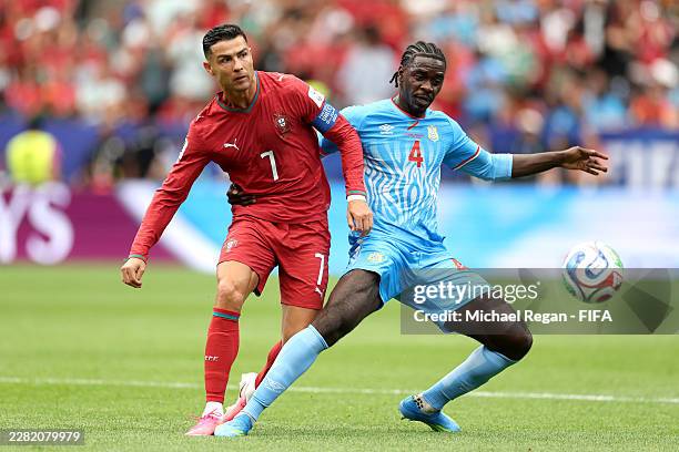 Cristiano Ronaldo of Portugal is challenged by Axel Tuanzebe of Congo DR during the FIFA World Cup 2026 Group K match between Portugal and Congo DR...
