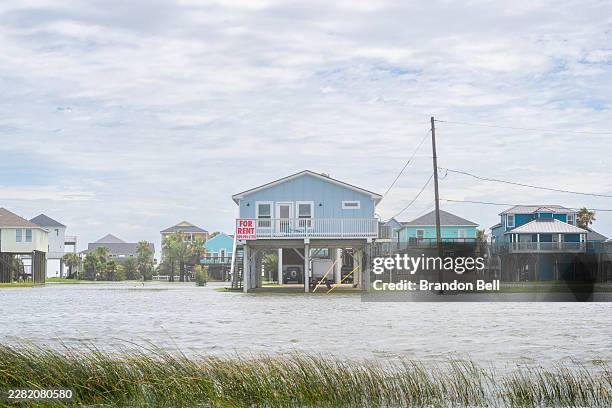 Floodwater surrounds a neighborhood after Tropical Storm Arthur made landfall on June 17, 2026 in Freeport, Texas. A Tropical Storm Watch has been...