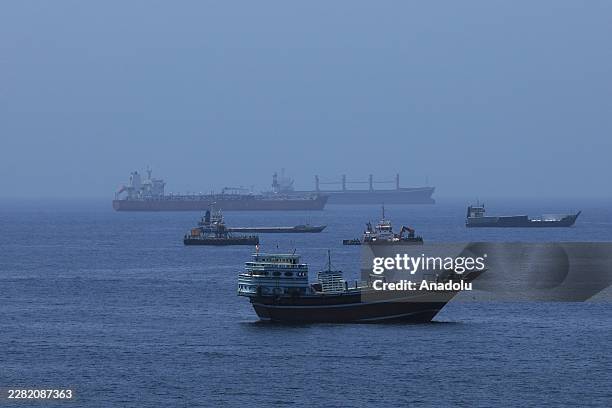 View of commercial cargo vessels and crude oil tankers are anchored in the Gulf of Oman, off the coast of Muscat, Oman, on June 21 as they prepare to...
